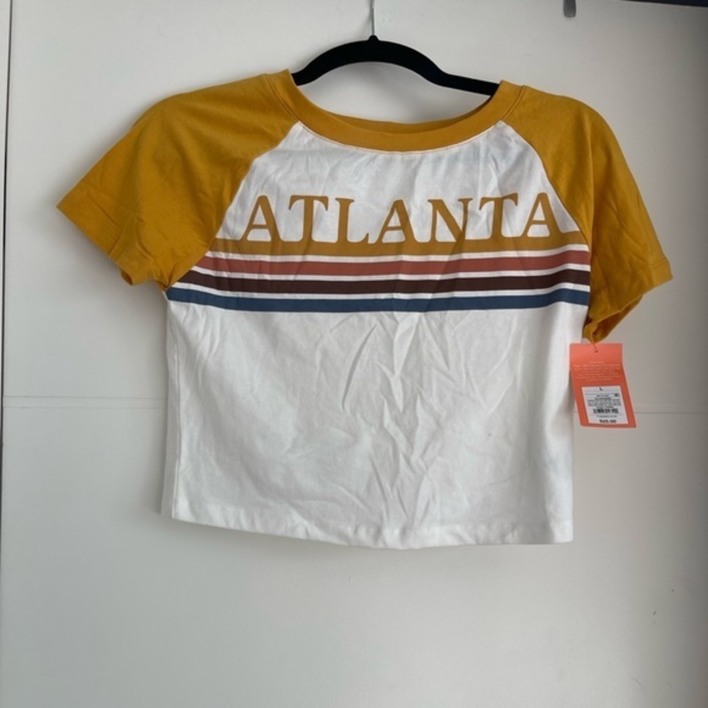 NWT Tee in size L
